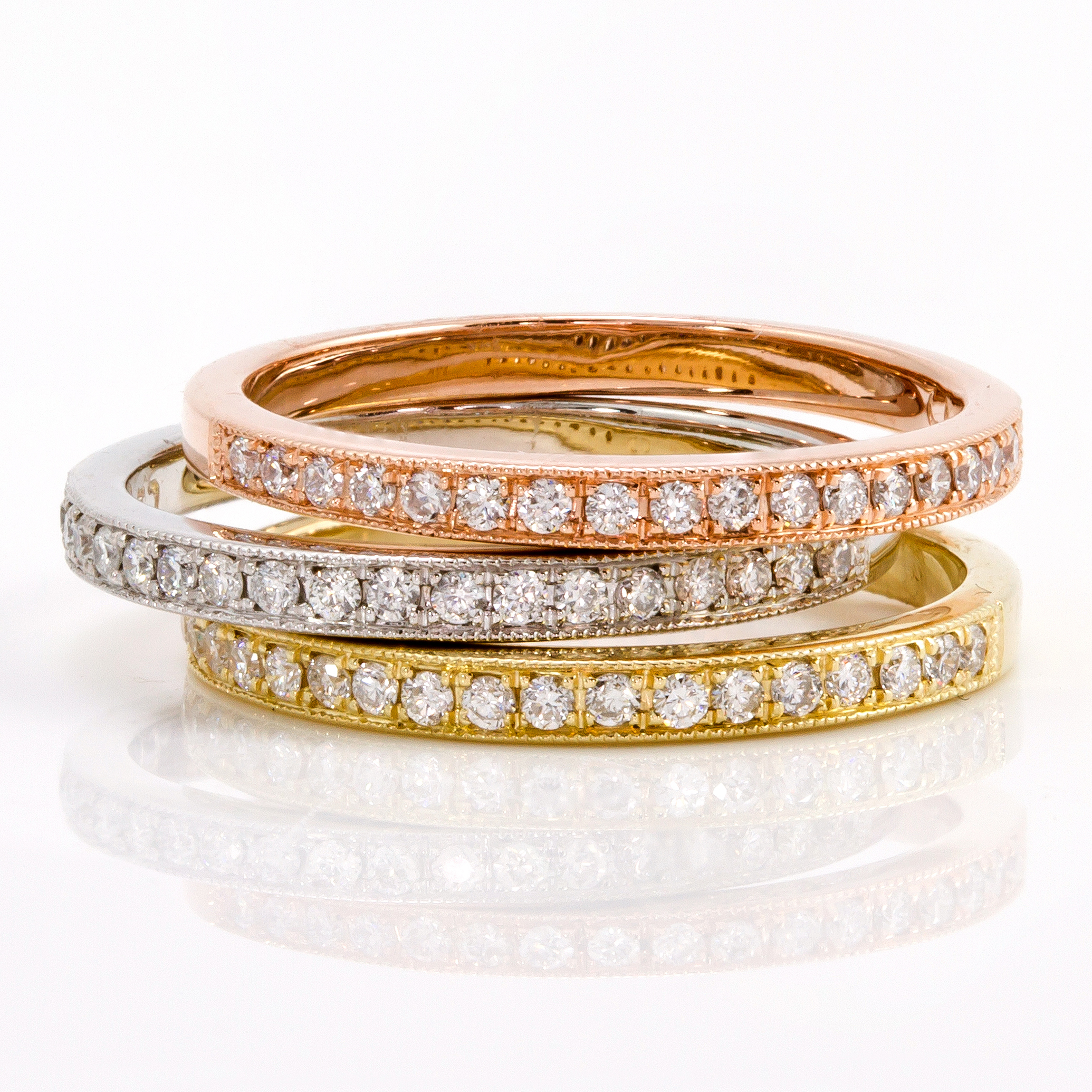 Diamond rings in yellow, white and rose gold